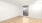 large room with wood floors