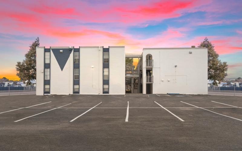 a building with a parking lot