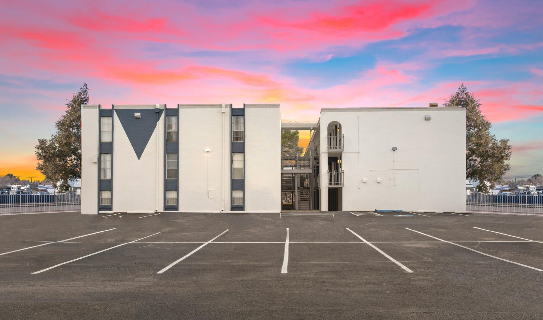 a building with a parking lot